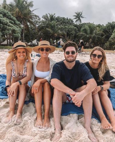 Tommy Bugg with his three sisters.